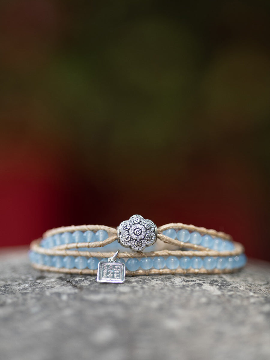 EastKarma AQUAMARINE HUNDRED SYLLABLES MANTRA BRAIDED BRACELET