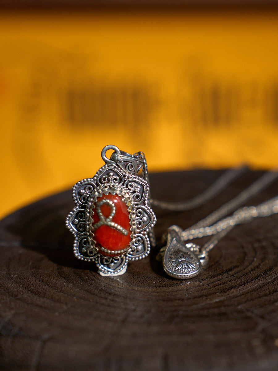 EastKarma SACRED LOVE NECKLACE WITH RED CORAL AND TURQUOISE – A HIMALAYAN SYMBOL OF DEVOTION AND HARMONY